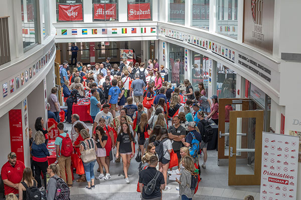 armstrong student center seal area during first year orientation resource fair with lots of students and parents