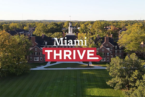 Video screenshot showing MiamiTHRIVE logo on photo of Miami University's Oxford campus