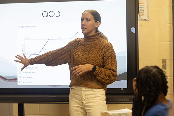 Student teacher a in classroom