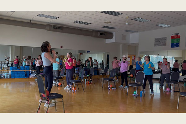 Hillary Swift, left, leads a class of the Silver Sneakers program, a fitness program for people 65 years old and older