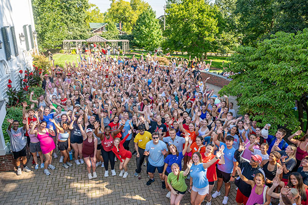 M.O.V.E. Bootcamp participants pose for a photo at Lewis Place