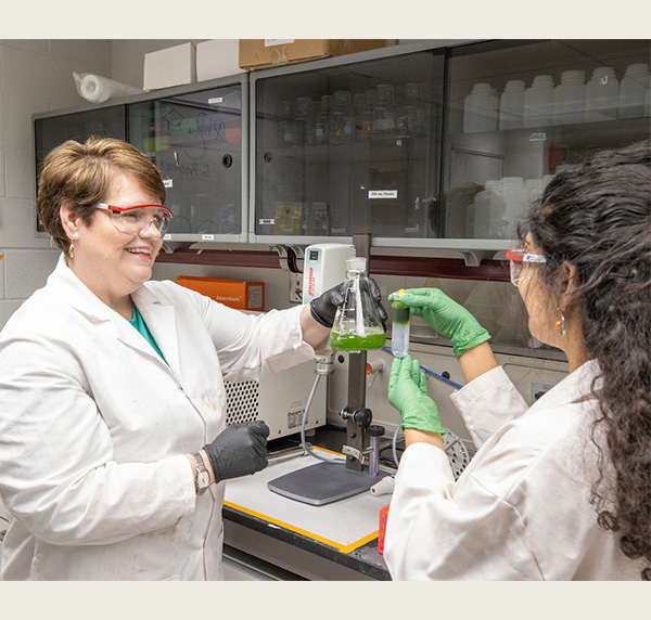 Carole Dabney-Smith with a student in her lab
