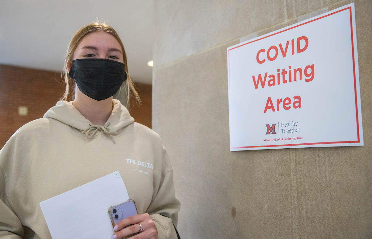 Kennedy Hymer leaving the waiting area while wearing a mask after being vaccinated