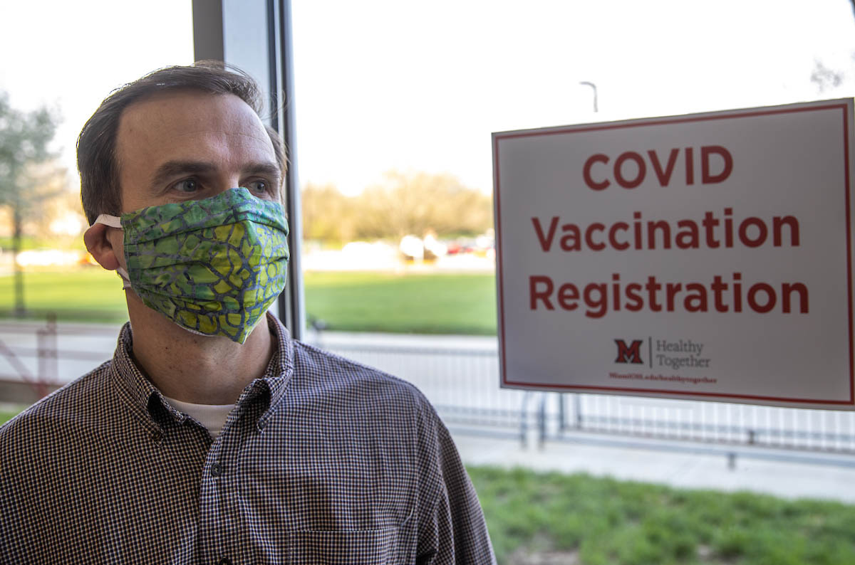 Andrew Sommers waiting to get signed in to get his vaccine