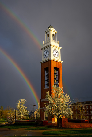 The south end of a double rainbow appears to end at the Pulley Tower.
