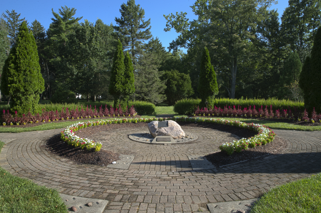 the bishop circle at formal gardens. a rock noting where Arthur Conrad is buried.