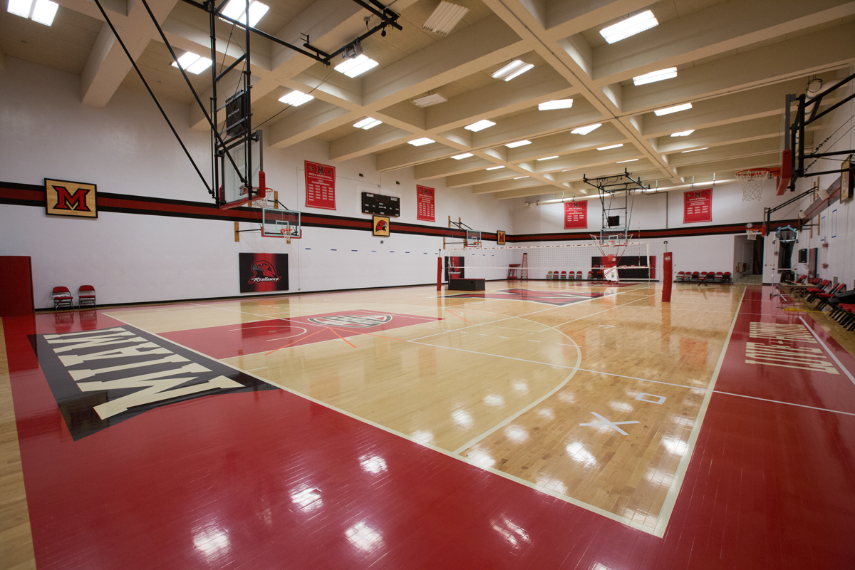 auxiliary gym in millett hall, set up for volleyball. 