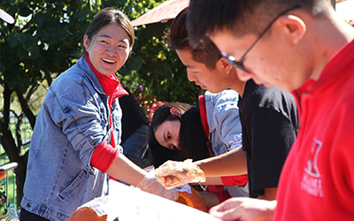 ELC Students volunteering at an event.