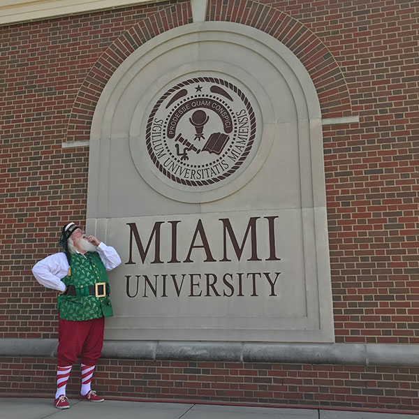 Santa standing outside of VOA.