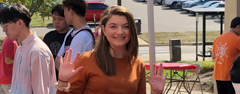  A student waving
