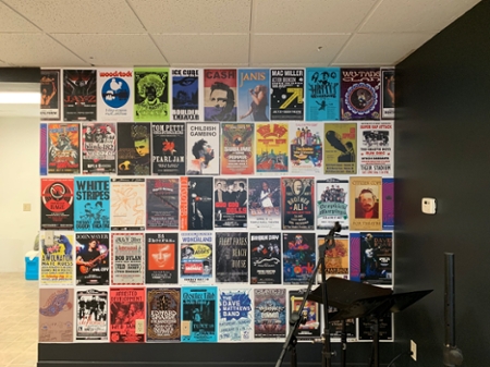 A wall with book covers inside The Fringe Coffee House 