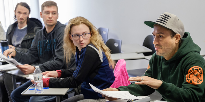  Students sitting in a classroom. 