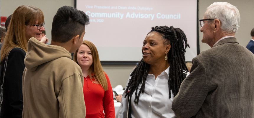  Yvette Kelly-Fields talking with people in the community