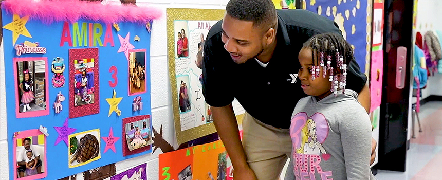 Samy Broyles, Miami Regionals Alumni working at the Booker T. Washington Center in Hamilton. 