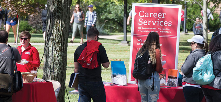  Students talking to the career services booth at Middletown Fall Fest