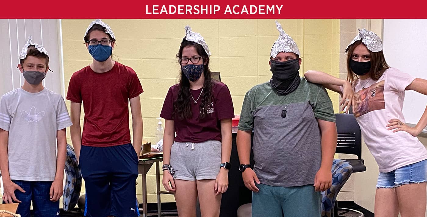 Leadership Academy: Participants with foil hats