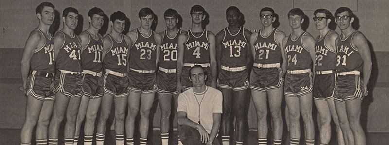  Lynn Darbyshire with one of the men's basketball teams that he coached. 