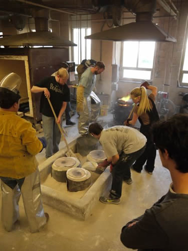 At work on a bronze sculpture assignment are Miami Hamilton students: (from left) Danny Kuhl, Art Professor Roscoe Wilson, Charles Saunders and Brandy Pfefferle. (Photos courtesy Eric England.)