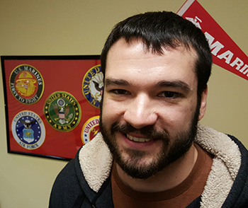 Photo of Quentin Jones in the MUH Student Veterans Center.