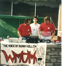 Jarrod Strick and Mike Handy with Tony Hale at the turntable at WMUM outdoor event