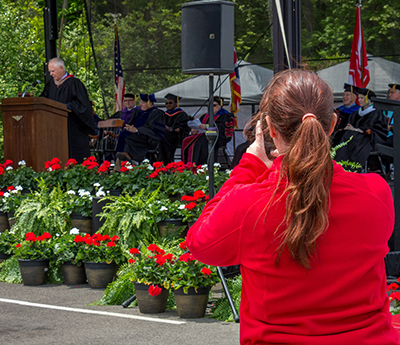 Ruth Orth taking cell phone pics during the Divisional Recognition Ceremony