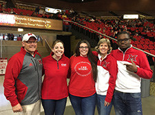 Thompson pictured in center with Miami President Greg Crawford, Caitlin Borges Former Regional Director of Student Activities and Orientation, Miami Regionals Dean Cathy Bishop-Clark and fellow student Calvin Sanvee at the One Miami game in Oxford.