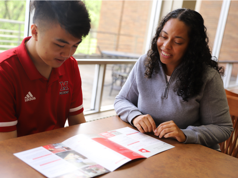 A student talking to a counselor