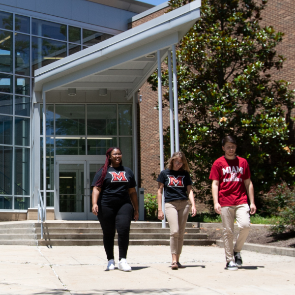 An admission counselor walking through the admission checklist with a student.