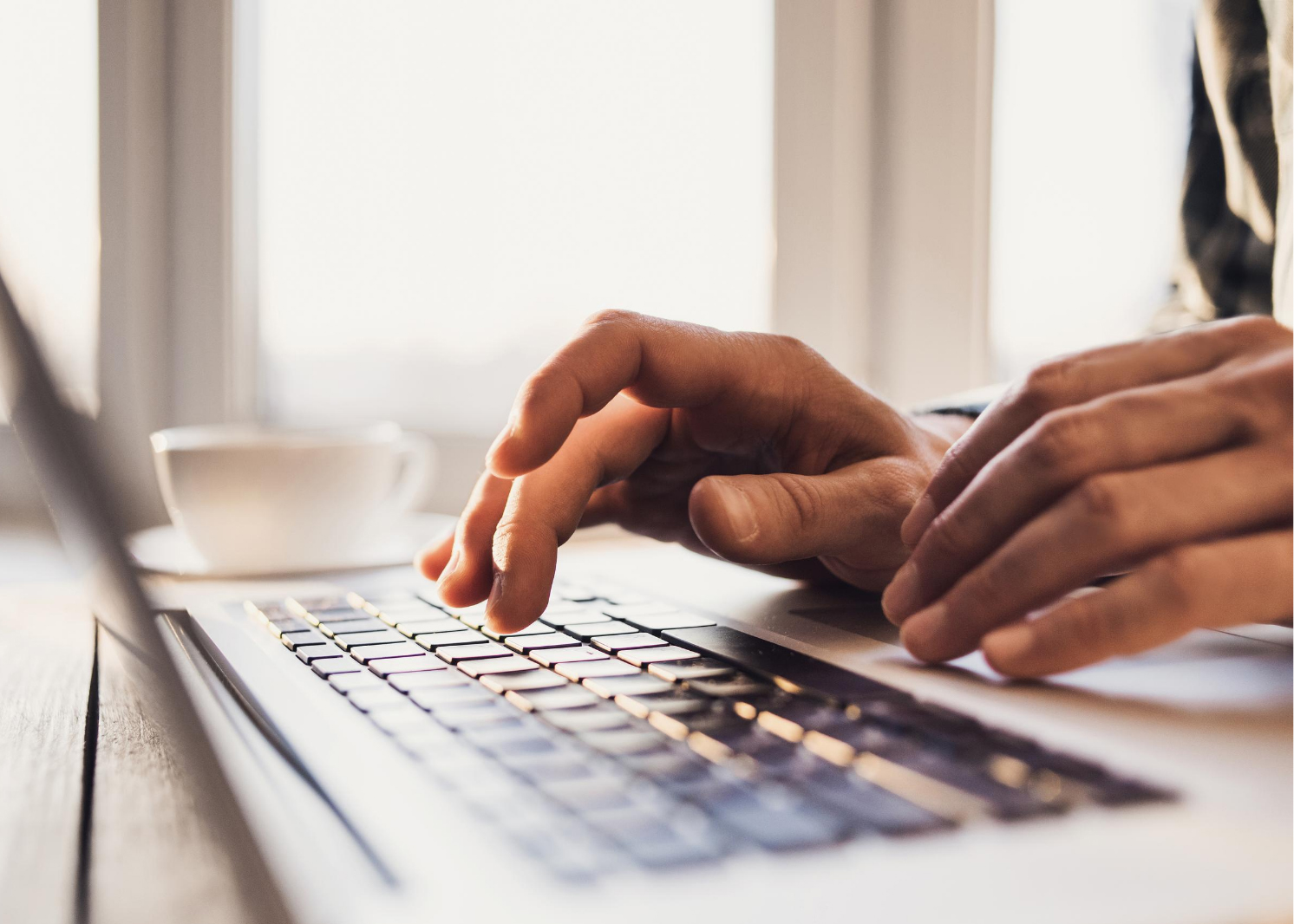 Person typing on a laptop