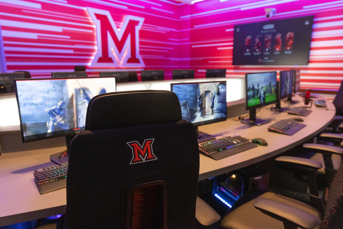 computers and chairs in the esports arena at Miami