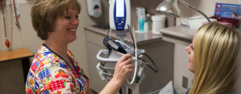 Nurse and student at a healthcare appointment