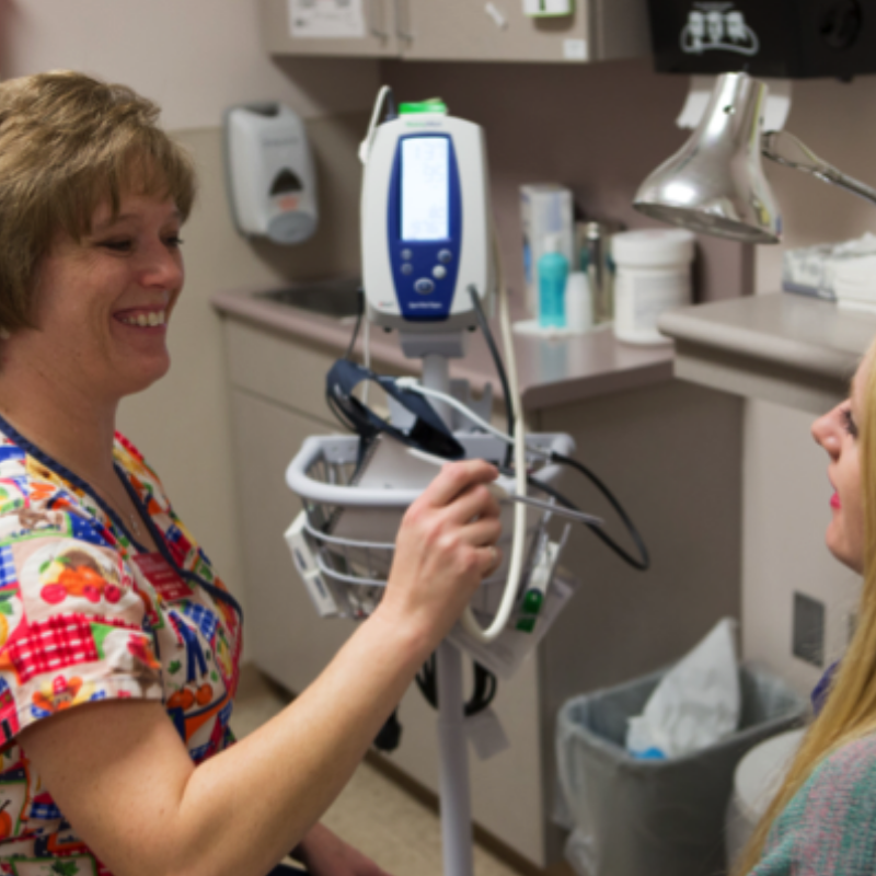 Nurse and student at a healthcare appointment