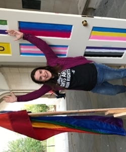 Student walking through a door frame in Upham Arch on National Coming Out Day
